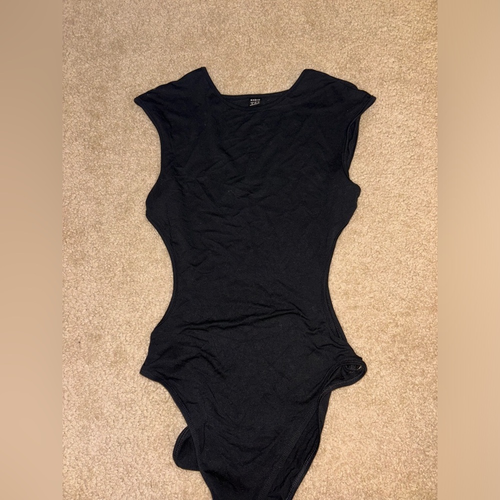 High neck black bodysuit with cut outs on the side fits medium